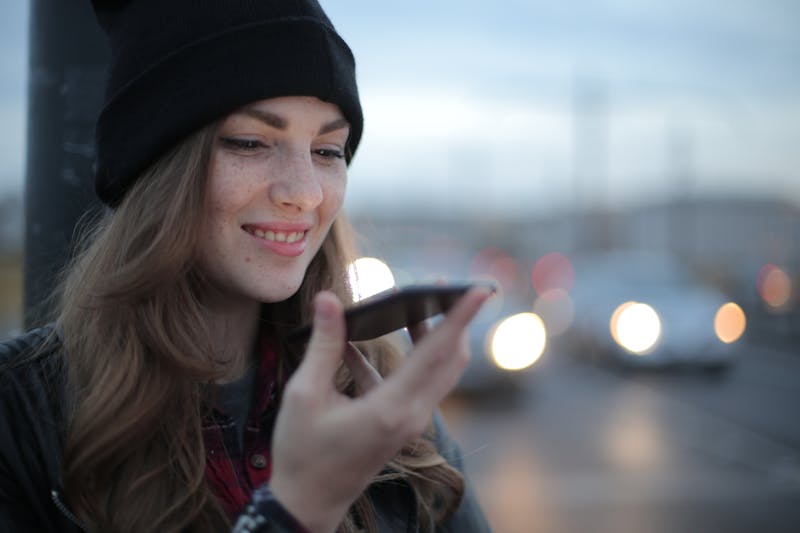 How do I enable voice messaging on my iPhone?