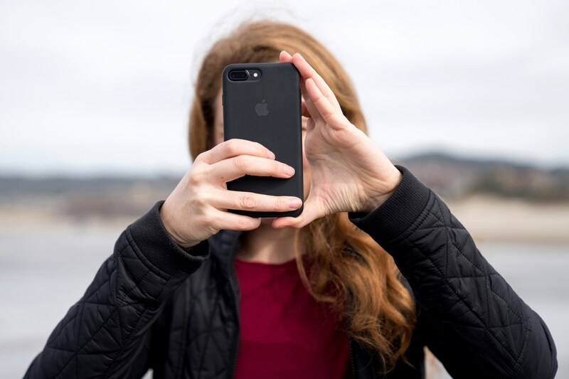 how to combine two photos on iphone
